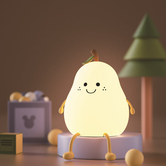 Charming and vibrant pear-shaped silicone night light. This adorable night light emits a soothing . A delightful gift for any occasion!"