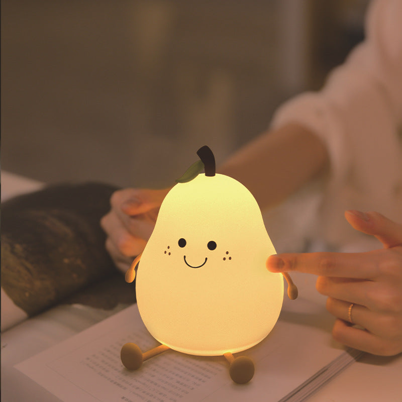 Charming and vibrant pear-shaped silicone night light. This adorable night light emits a soothing . A delightful gift for any occasion!"