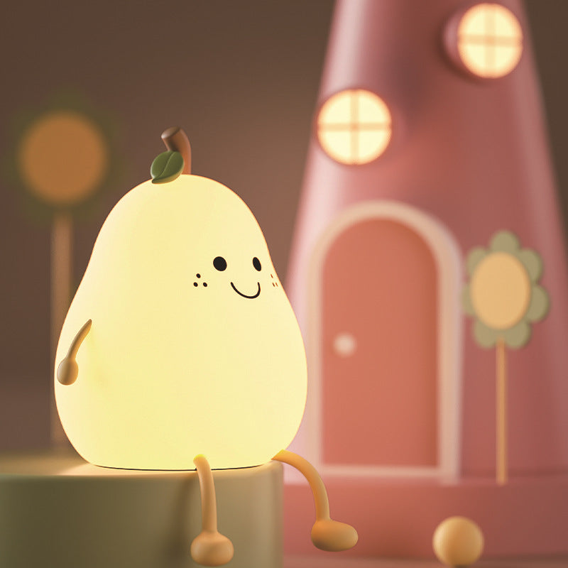 Charming and vibrant pear-shaped silicone night light. This adorable night light emits a soothing . A delightful gift for any occasion!"